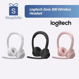 Logitech Zone 300 Bluetooth headset resting next to a laptop and a smartphone on a clean office desk, highlighting its dual-device multipoint connectivity_custom premium corporate gifts singapore