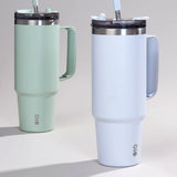 Montigo Solo Travel Mug 890ml in Powder Peach with a large ergonomic handle, dual-function straw lid, and a matte powder-coated finish_corporate gifts