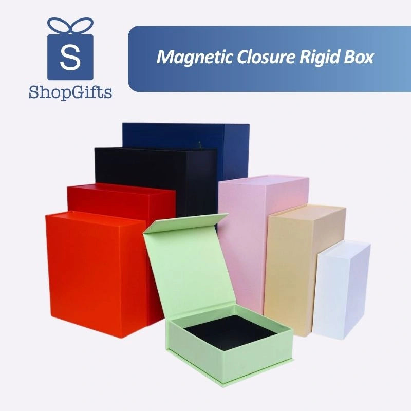A collection of premium Magnetic Closure Rigid Boxes in various sizes and colors, including black, red, navy, pink, and lime green, featuring a seamless flip-top lid with a concealed magnetic seal. corporate gift