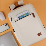 Cream /Black and brown Minimalist Executive Waterproof Tech Backpack with USB port and multiple storage compartments. Gift shop