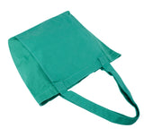Green tote bag on a white background