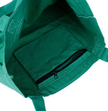 Green backpack with a black zipper pocket on a white background