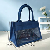 Natural jute tote bag with a clear PVC display window and padded handles on a grassy background_corporate jute bag_corporate door gift