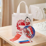 Custom Singapore NDP Celebration gift pack featuring a branded eco-friendly white tote bag, red Merlion hand fan, patriotic coin pouch, handheld flag, and custom pens for corporate gifting_Promotional Corporate Gifts