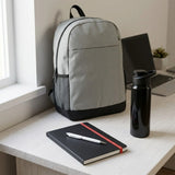Corporate onboarding gift set featuring a mint green backpack, blue water bottle, and notebook_Gift Set Singpaore_Customised Gift Set