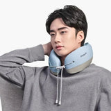 Person using a blue neck pillow on a white background