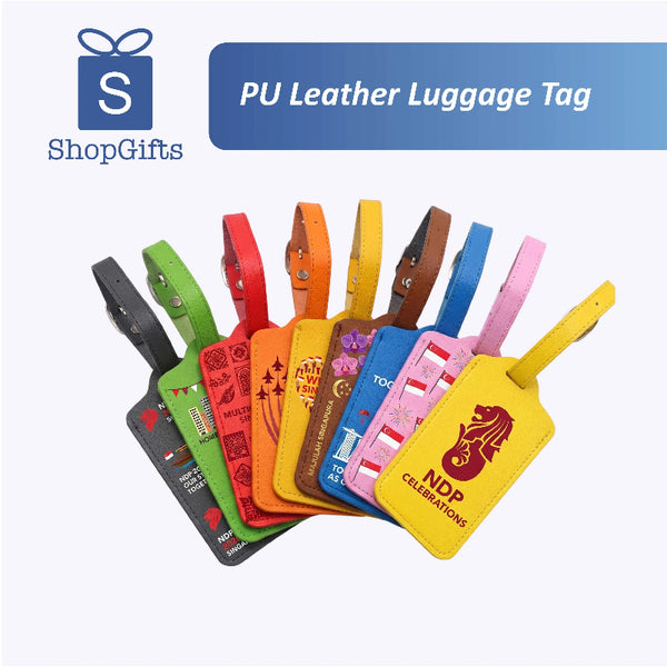 Collection of colorful PU leather luggage tags with ShopGifts branding.