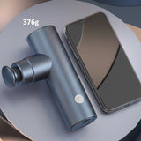 Metallic Blue Elite Ultra-Portable Percussion Massager with four interchangeable heads on a wooden surface_Premium door gift_corporate gift