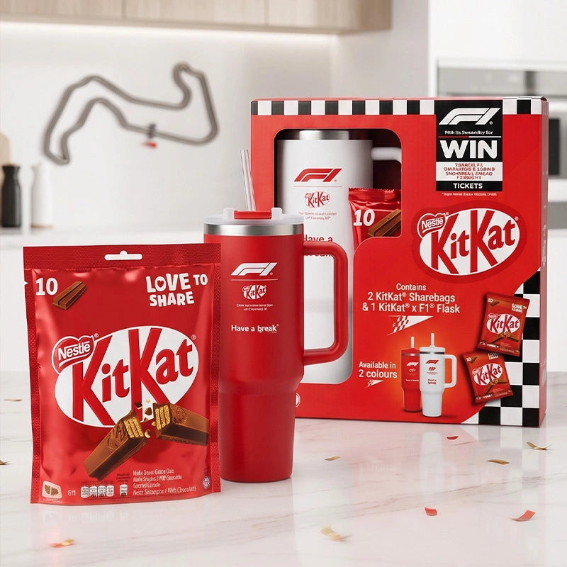 KitKat products including a red mug, packaging, and sharepack on a white surface.