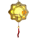 Hands assembling Retro Palace DIY Lantern kit on table