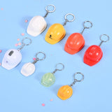 Miniature orange safety helmet keychain with LED light and integrated bottle opener_ corporate gift
