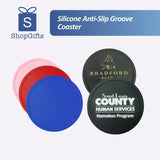 Minimalist food-grade silicone anti-slip coaster with raised edge for heat protection and spill containment_ corporate gift
