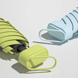 Pastel-colored Ultra-Compact Six-Fold Ring Buckle Umbrellas with UV-blocking black glue coating for sun protection _ corporate gifts