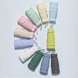 Pastel-colored Ultra-Compact Six-Fold Ring Buckle Umbrellas with UV-blocking black glue coating for sun protection _ corporate gifts