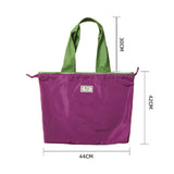 Purple tote bag with green handles and dimensions labeled on a white background