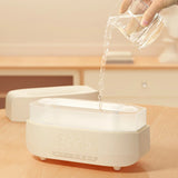 Modern humidifier designed to mimic a real flame with ambient lighting