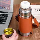 Titanium Bottle with Leather Carrier