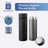Titanium hygienic thermal bottle with antibacteria and titanium logos on a white background