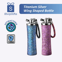 Two wing-shaped bottles, one blue and one purple, with 'ShopGifts' branding and antibacterial and titanium logos on a white background.