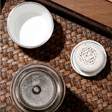 Three Titanium Thermal Brew Mug accessories on a woven mat