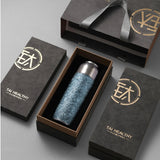 Blue textured tumbler in a black box with 'Tai Healthy' branding