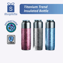 Three titanium trend insulated bottles in pink, silver, and blue