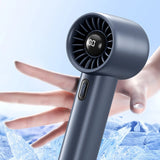 One hand is about to grab this handheld electric fan