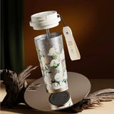 Elegant Van Gogh-inspired vacuum tumbler in pure titanium, designed for upscale corporate gifting.
