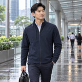 Water-Repellent 4-Way Stretch Corporate Jacket (J11) in navy, worn during an urban commute_corporate apparel singapore