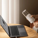 Xiaomi 300ml Portable Blender  with a transparent cup and silicone sleeve for smoothies.