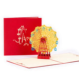 Red 3D pop-up card with a yellow Ferris whee